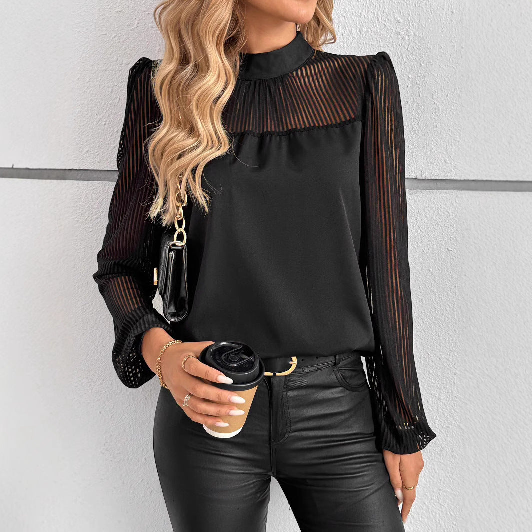 Damebluse med transparente striber og elegant pasform Stilla