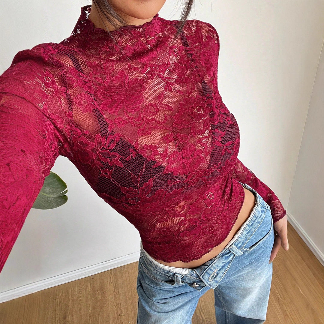 Dame nan figurbetonede transparente spids-crop-top med høj hals og integreret bustier-form Skovae