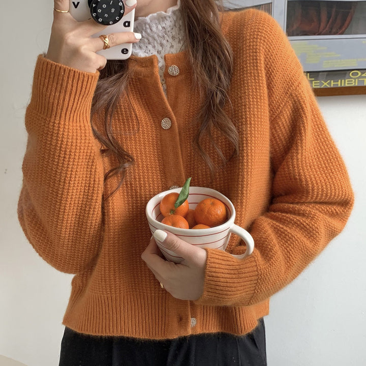Kvinders cardigan med sofistikeret knapdetalje og bred pasform Stilla