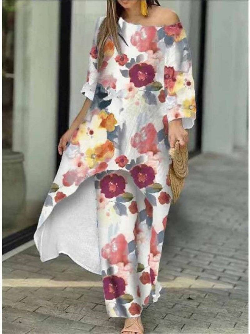 Dame maxikjole med blomsterdesign og asymmetrisk kant Stilla