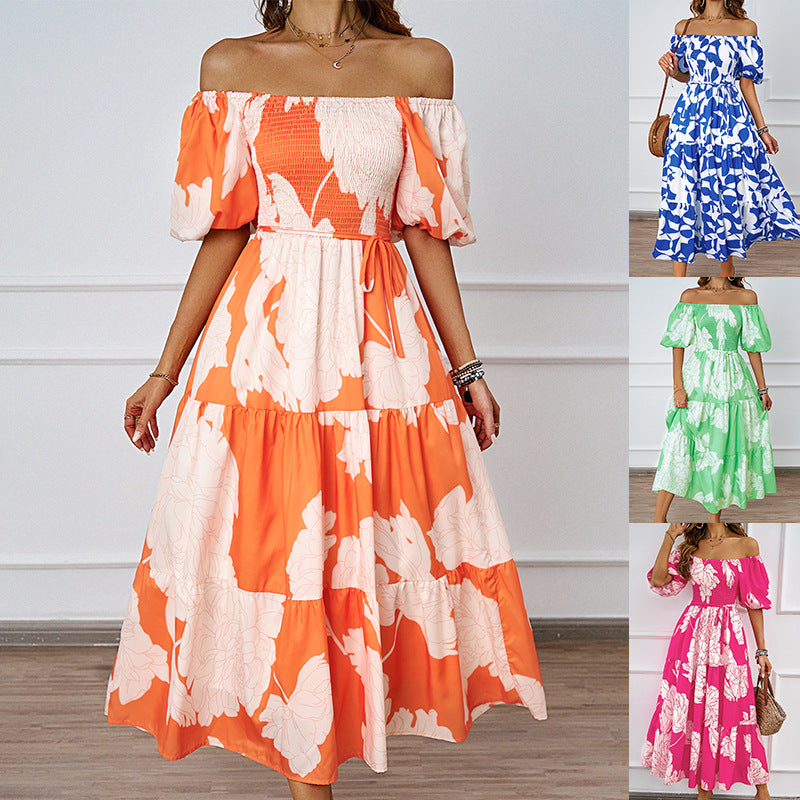 Dame maxikjole i afslappet off-shoulder design med voluminøse ærmer og blomsterprint Stilla