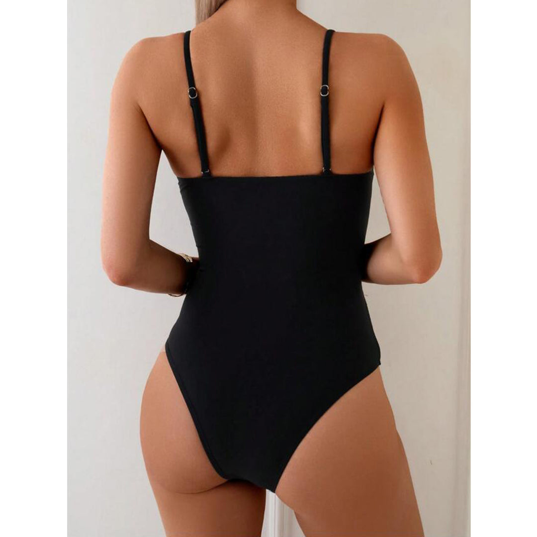 Dame en-dels badedragt med aftageligt smykkedetalje og raffineret cut-out Stilla