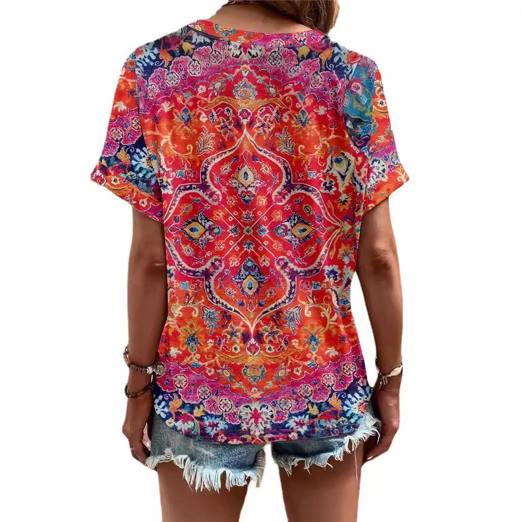 Damebluse med blomsterdesign og knaplukning Stilla
