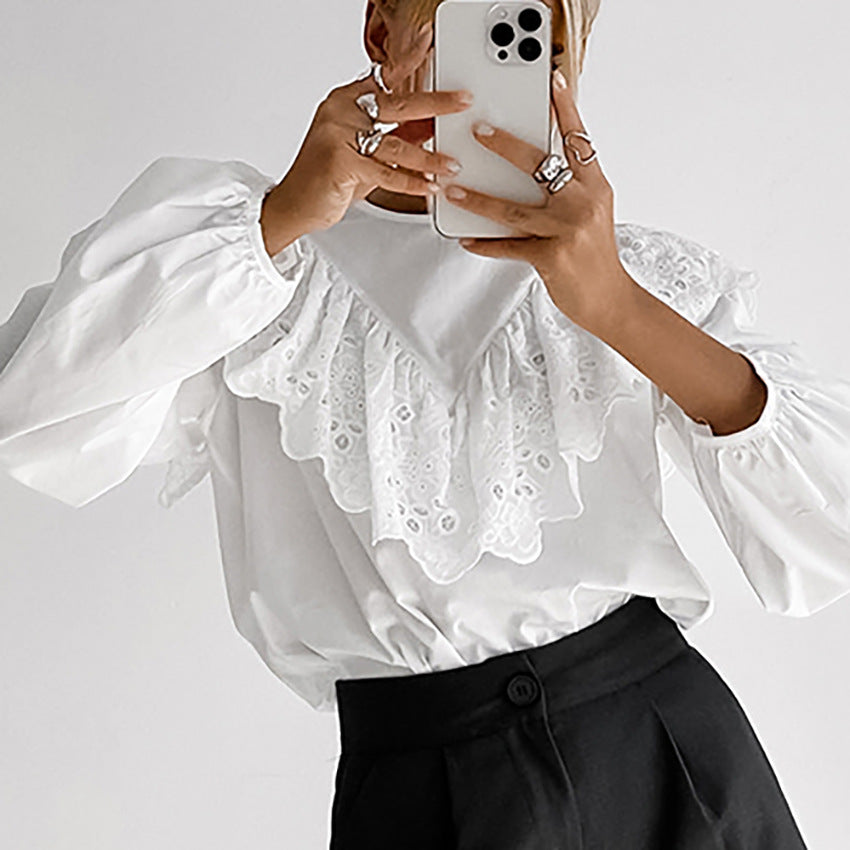 Damebluse med elegant spids og voluminøse ærmer Stilla