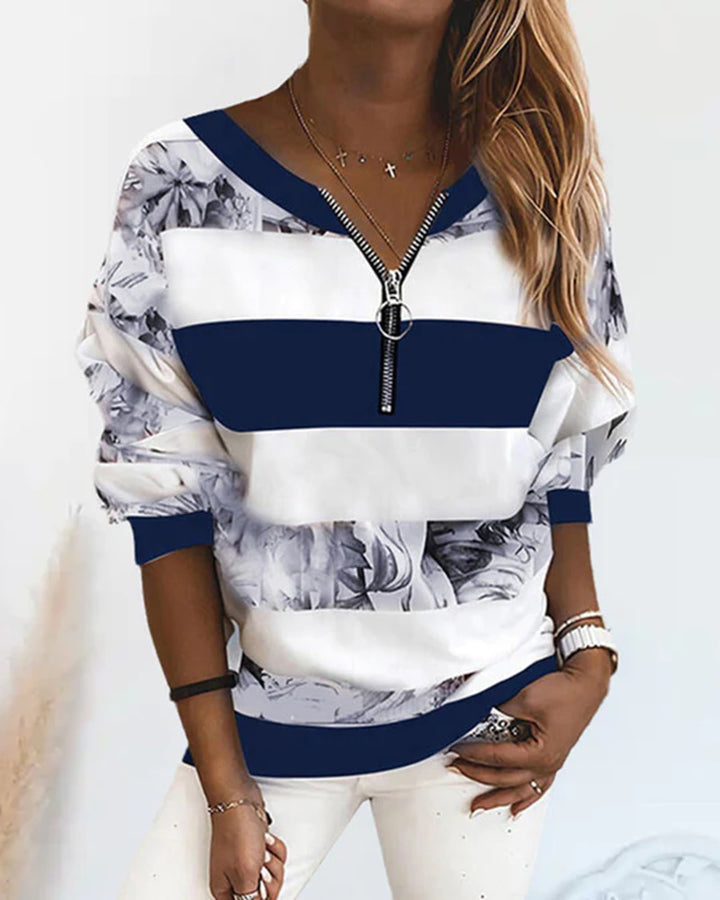 Damer let oversized sweatshirt med ringlynlås, blokstriber og blomsterindsats Skovae