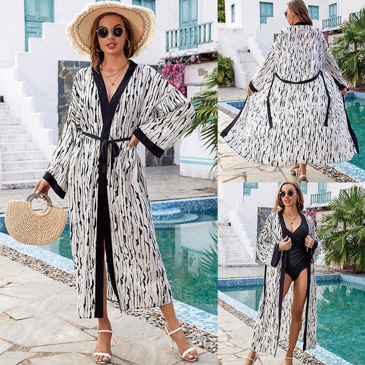 Dame elegant strandkimono med raffineret palmemønster og taljerbar bælte Stilla