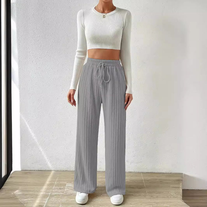 Dame afslappet lounge-sæt med strækbart crop-top og bløde palazzo-bukser Stilla