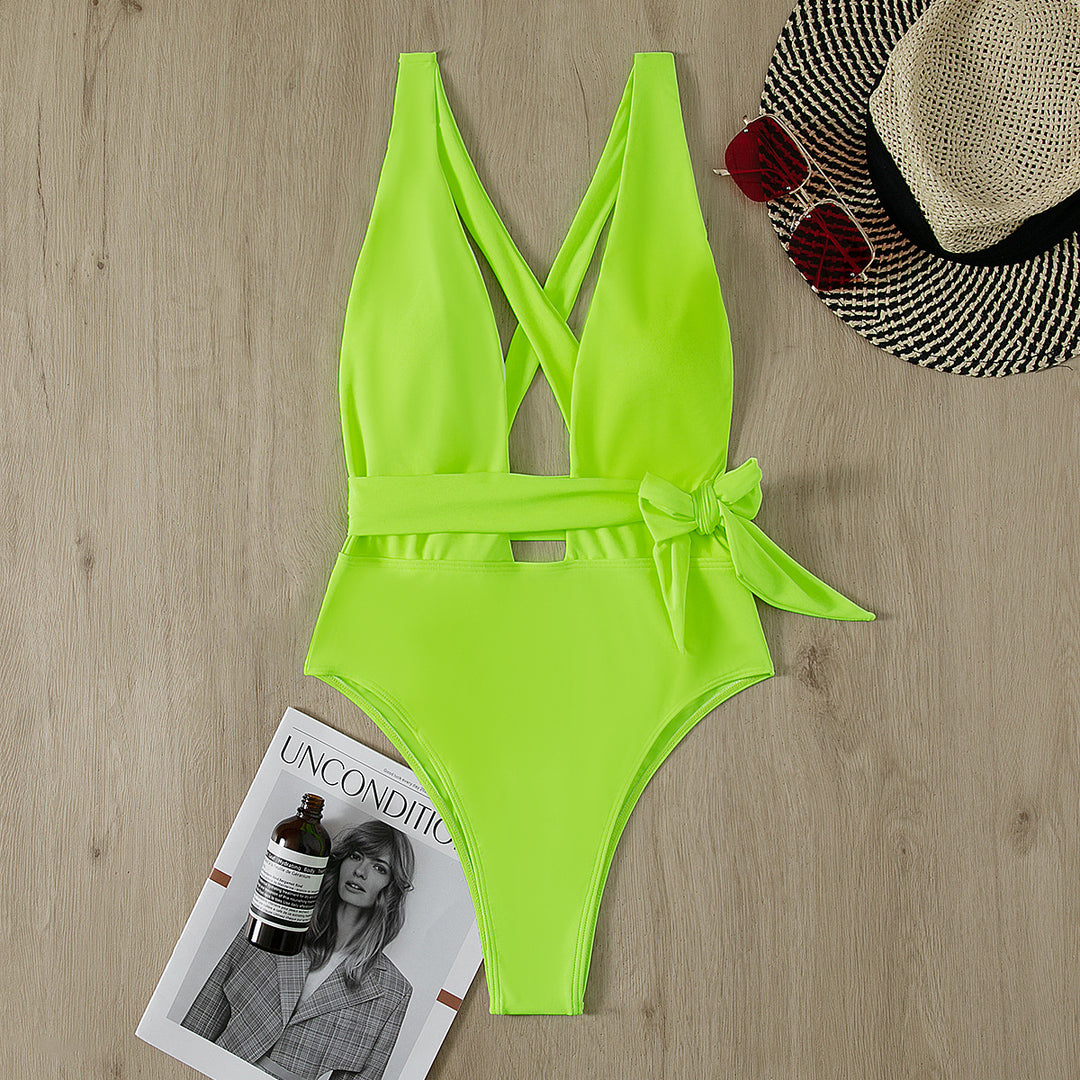 Dame sporty one-piece swimsuit with cross-back and tie belt Skovae