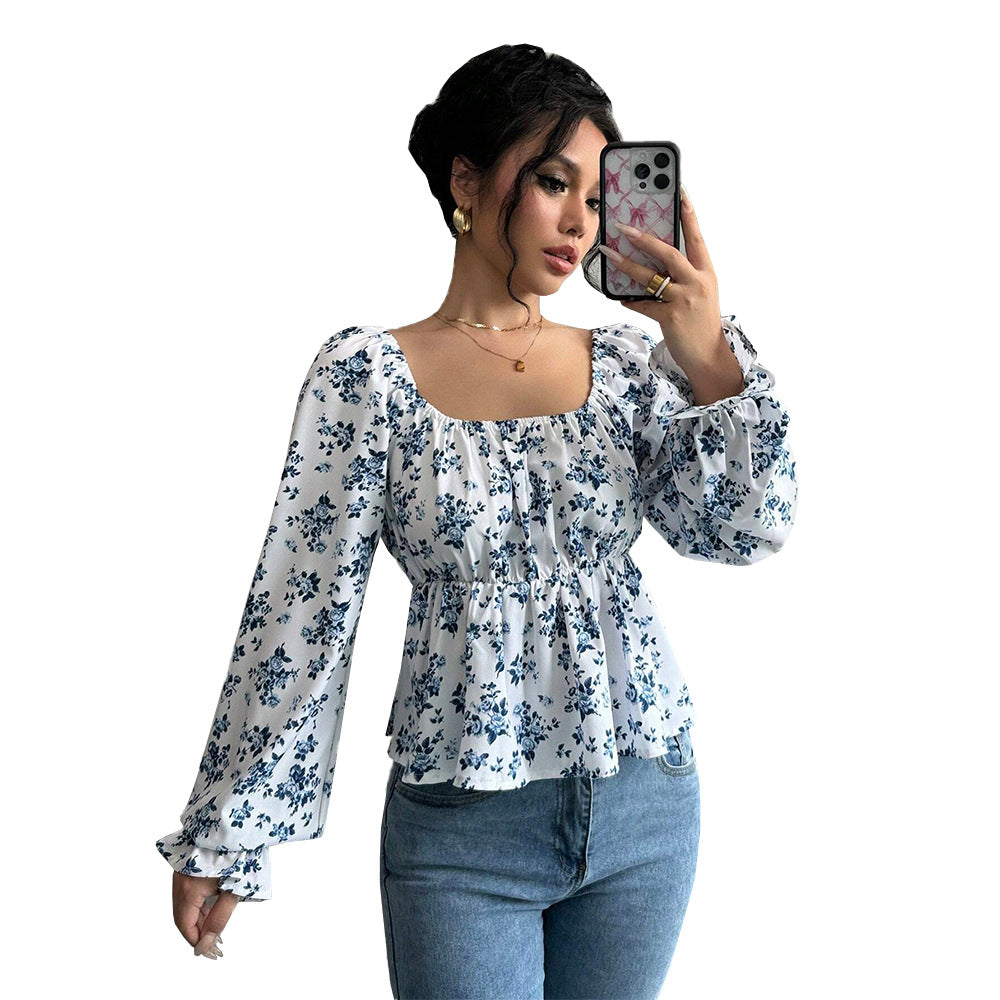 Kvinders bluse med blomsterdesign og voluminøse ærmer Stilla