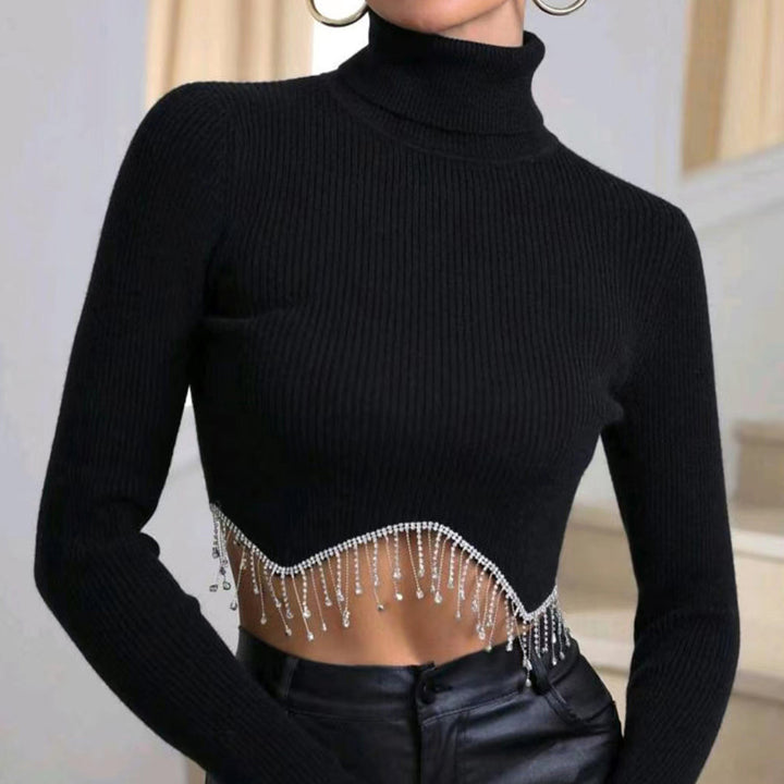 Dame moderigtig rullekravesweater med glitrende dekorationer Stilla
