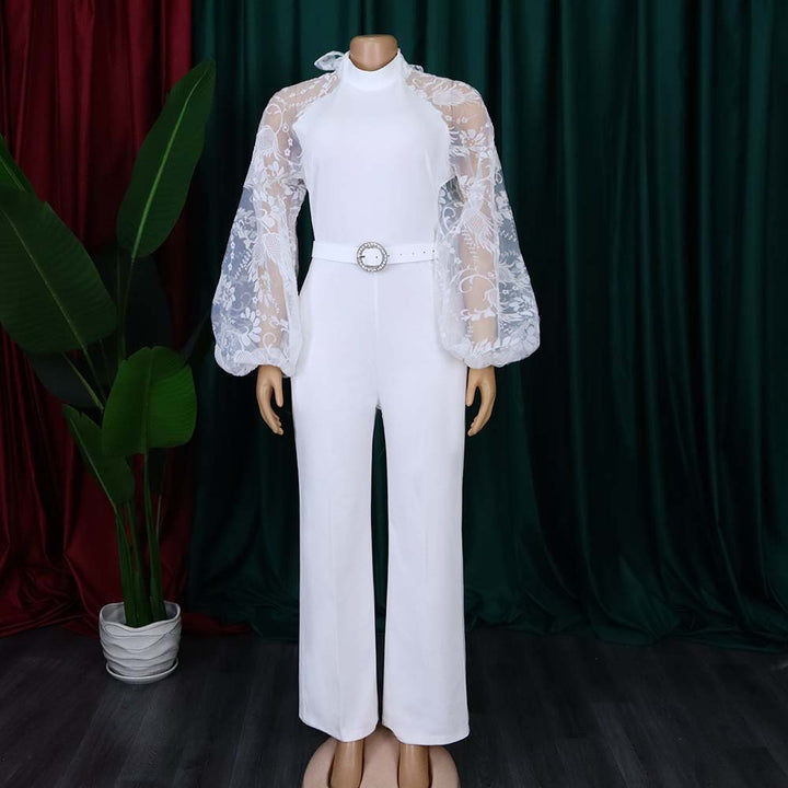 Dame jumpsuit med transparente puffærmer og taljerbar bælte Stilla