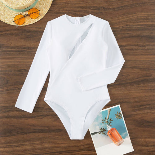 Dame one-piece badedragt med stilfuld cut-out og langærmet Stilla