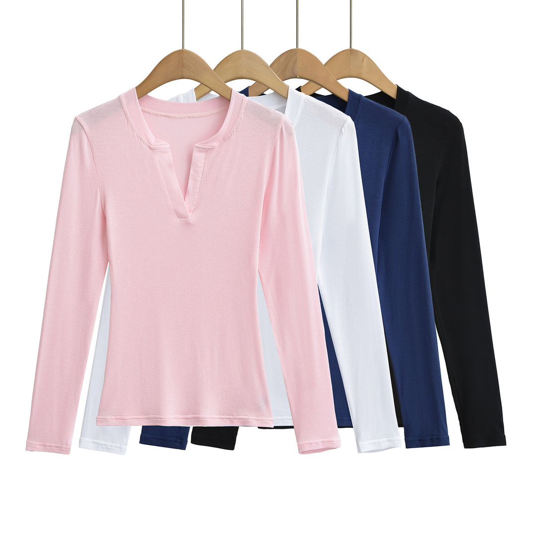 Damer longsleeve top med moderne V-halsudskæring og fin struktur Stilla