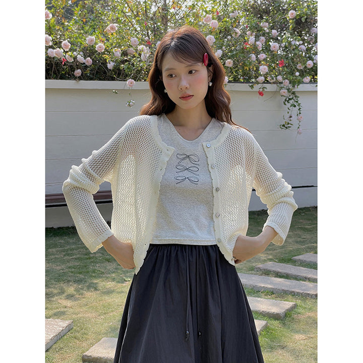 Dame strikstola med elegant off-shoulder-detalje Stilla