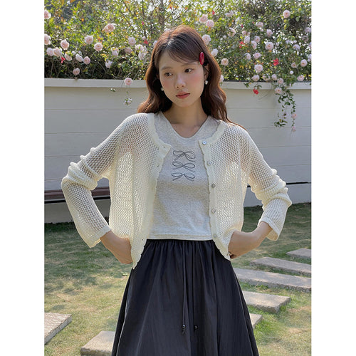 Dame strikstola med elegant off-shoulder-detalje Stilla
