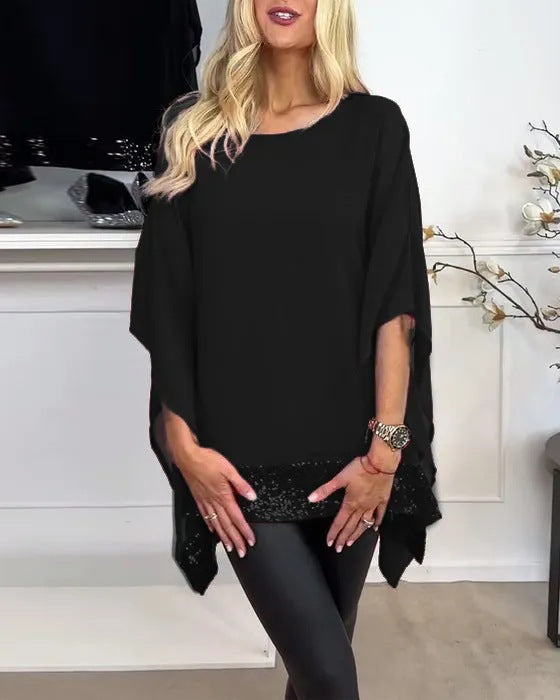 Kvindernes fashionable poncho top med elegant blonderfinish Stilla