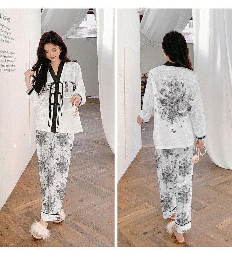 Dame luksus natwear sæt med blomstermønster og elegant design Stilla