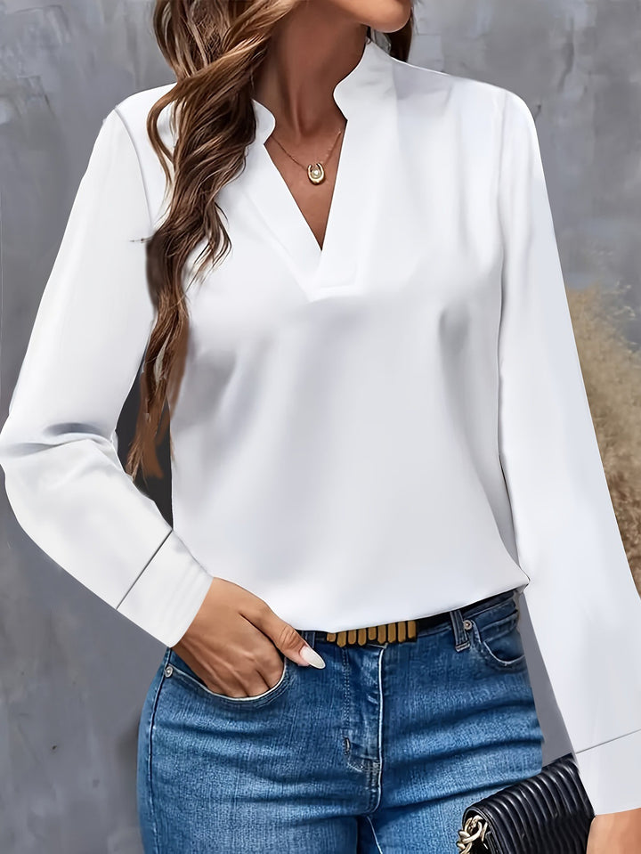 Damebluse med moderne V-halsudskæring og elegante lange ærmer Stilla
