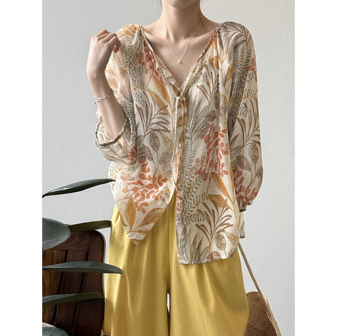 Damebluse med blomstertryk og justerbart bindingbånd Stilla