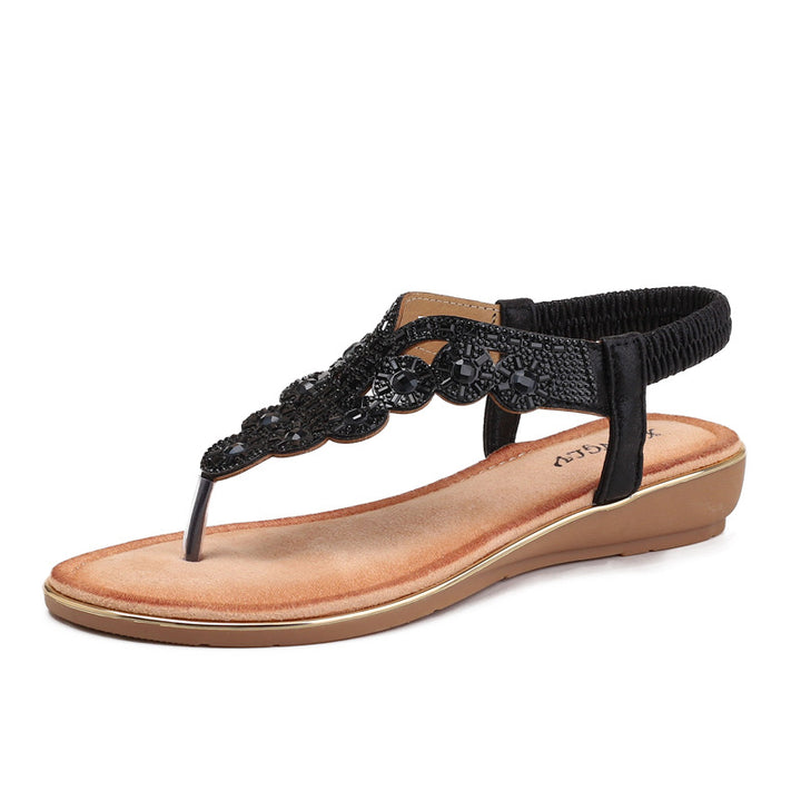 Dame flip-flops med glitrende smykkedetaljer og komfortabel fodseng Stilla