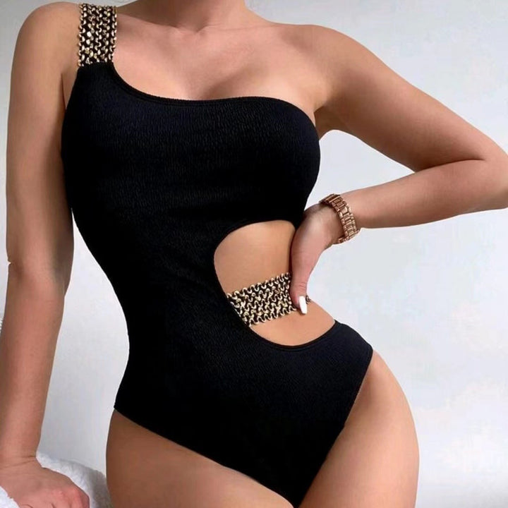 Damer en-delt badedragt med trendy cut-out og modige binde-detaljer Stilla