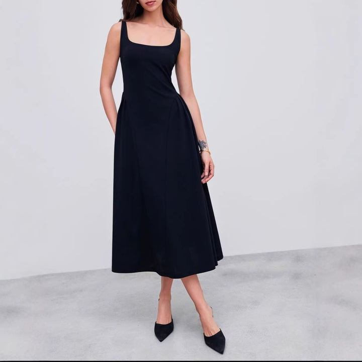 Dame maxikjole med off-shoulder design og figurvenlig pasform Skovae