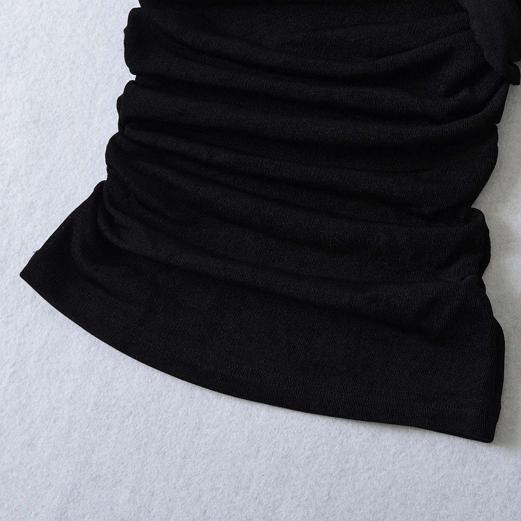Dame asymmetrisk flæse top med elegant drapering detaljer Stilla