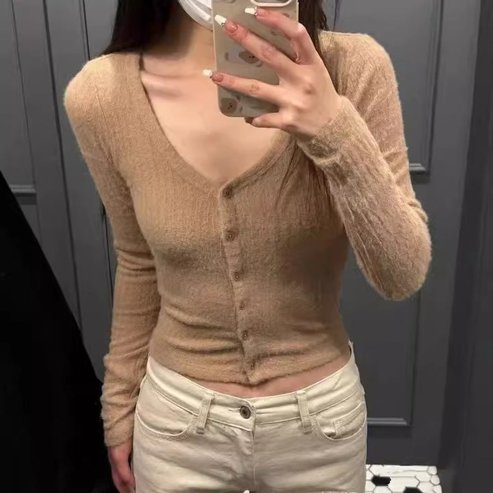 Dame mode cardigan med V-hals og knaplukning Stilla
