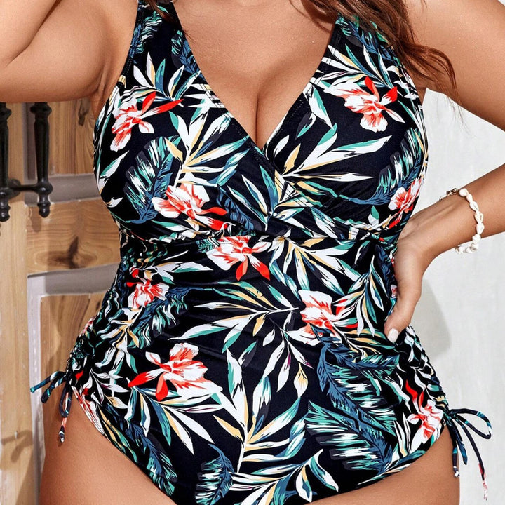 Dame one-piece badedragt med blomster-omslagsdesign og figurformende ruching Skovae