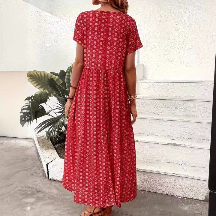 Dame maxikjole med håndlavet blomster mønster og praktiske sidelommer Stilla