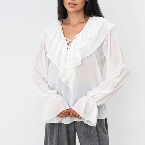 Damebluse med volantdesign og glitrende ærmer Stilla
