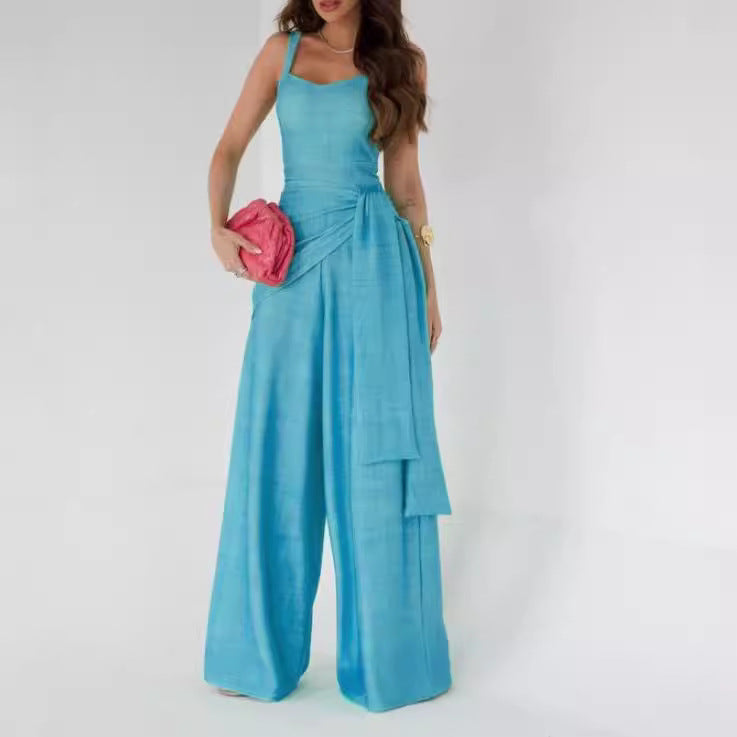 Dame bredt jumpsuit med elegante draperinger og stropper Stilla