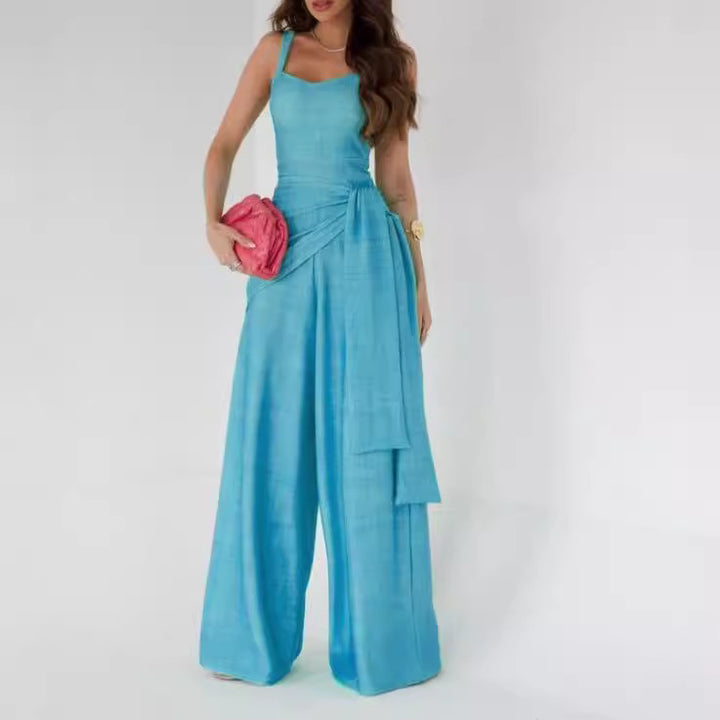 Dame bredt jumpsuit med elegante draperinger og stropper Stilla