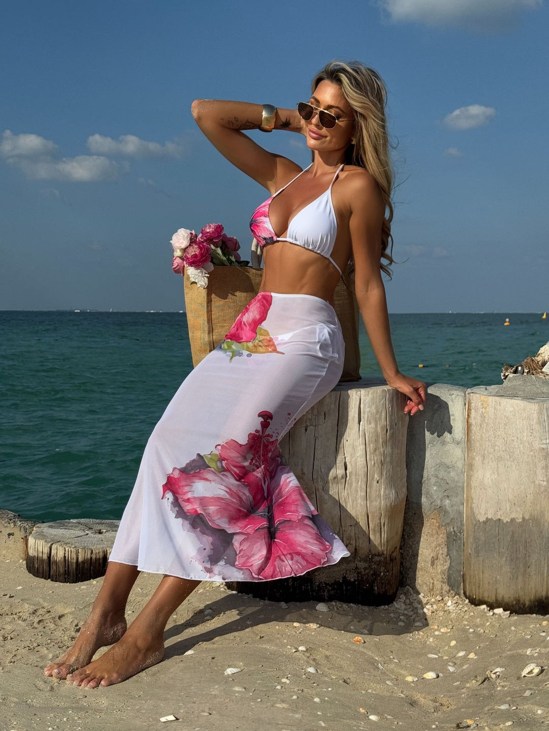 Dame Strandkjole med florale printdetaljer og let, flydende stof Stilla