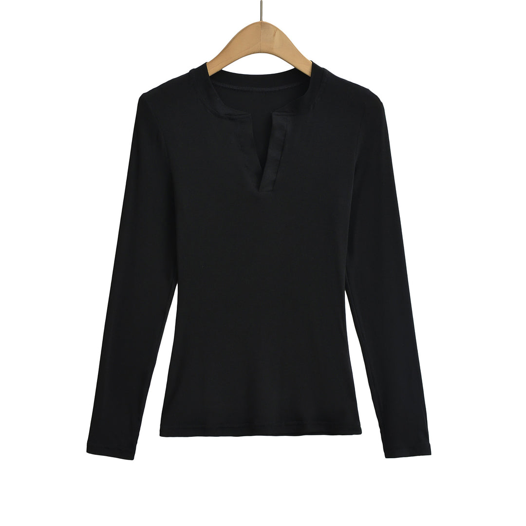 Damer longsleeve top med moderne V-halsudskæring og fin struktur Stilla