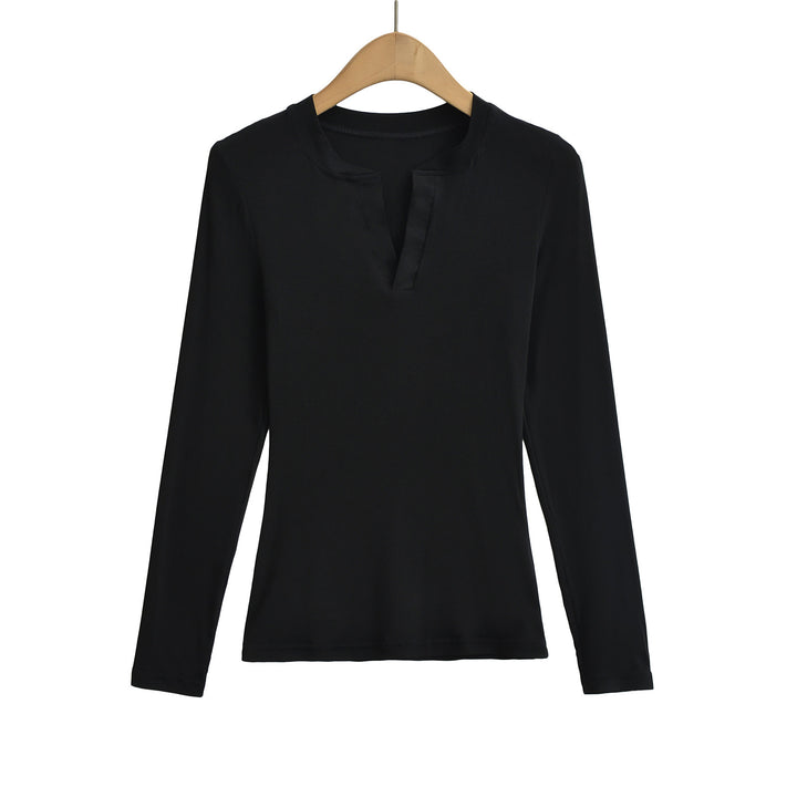 Damer longsleeve top med moderne V-halsudskæring og fin struktur Stilla