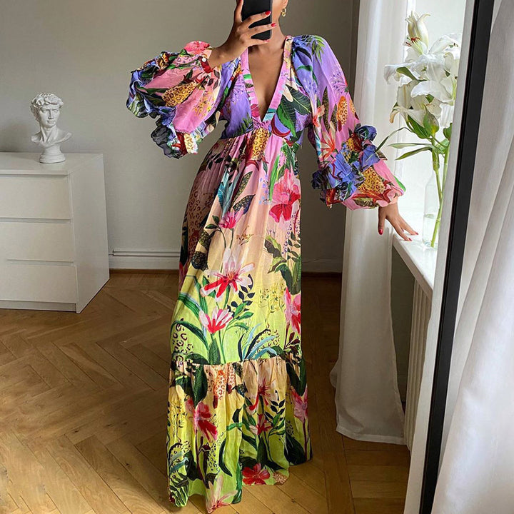 Dame Maxi-kjole med voluminøse flæseærmer og floral design Stilla