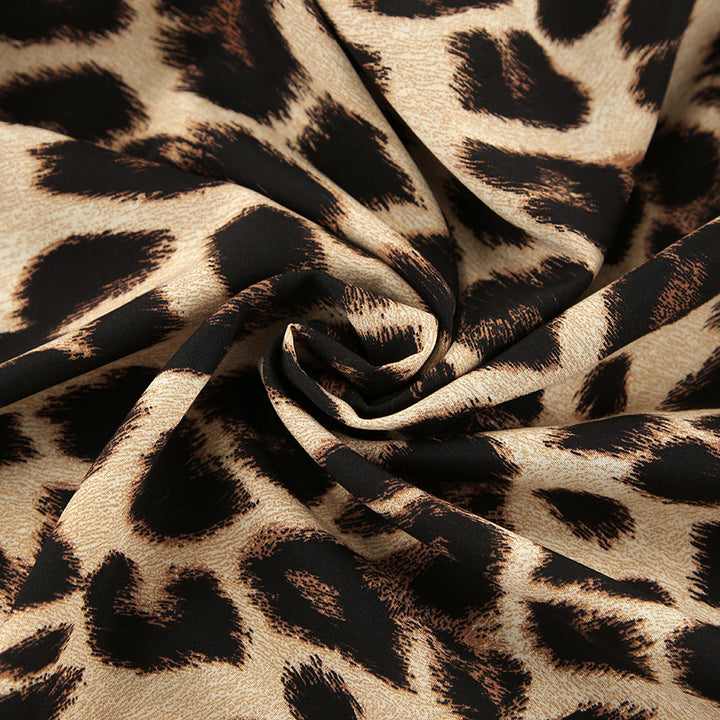 Dame leopardmønster crop-top og nederdel sæt med vide ærmer og cut-out detaljer Stilla