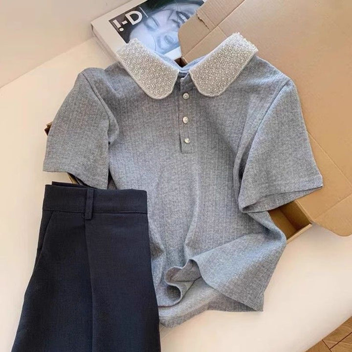 Dame polo top med elegant krave Stilla
