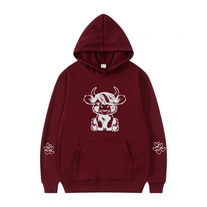 Kvindernes hætte sweatshirt med charmerende kvægmotiv og praktiske kængurulommer Skovae