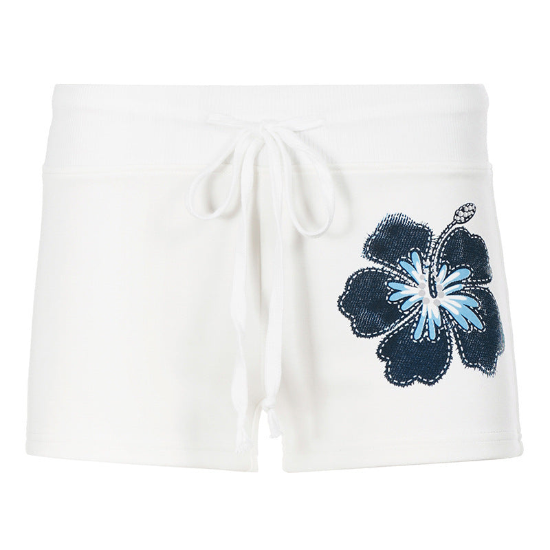 Damen Sportliche Short mit floralem Druck Skovae