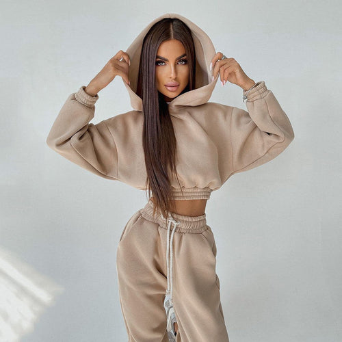 Kvinders sporty cropped sweat sæt med elastisk talje og praktiske lommer