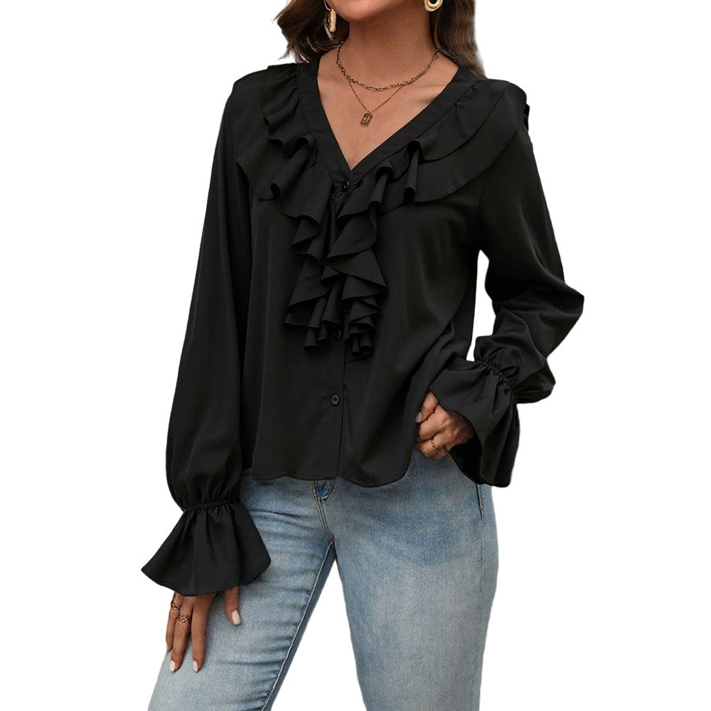 Damebluse med elegante ruffle-detaljer og chic V-hals Stilla