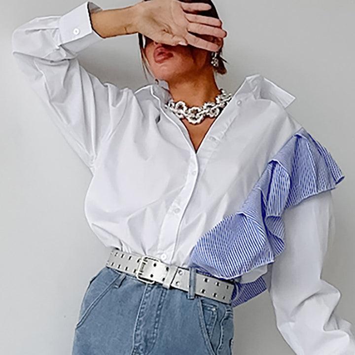 Damebluse med asymmetrisk flæsedesign og moderne snit Stilla