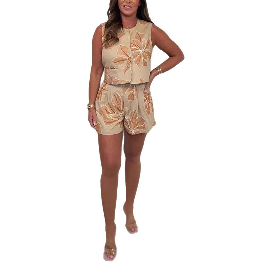 Dame to-delt ensemble med blomstret design og figursyet vest Stilla