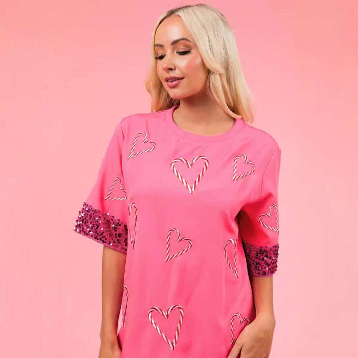 Dame mode T-shirt med glitrende pailletærmer og hjertemotiv Stiila