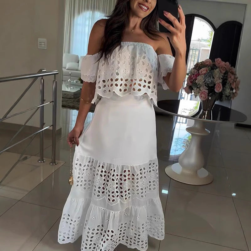 Dame Maxi-nederdel med raffineret cut-out-design og voluminøs kant Stilla