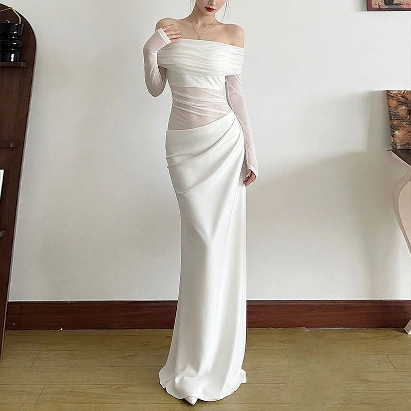 Kvindernes elegante off-shoulder maxikjole med flæsedetaljer og lange ærmer Stilla