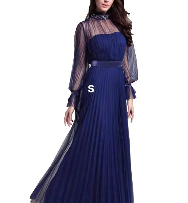 Kvindernes elegante maxi kjole med glitrende chiffon og legende flæse detaljer Skovae