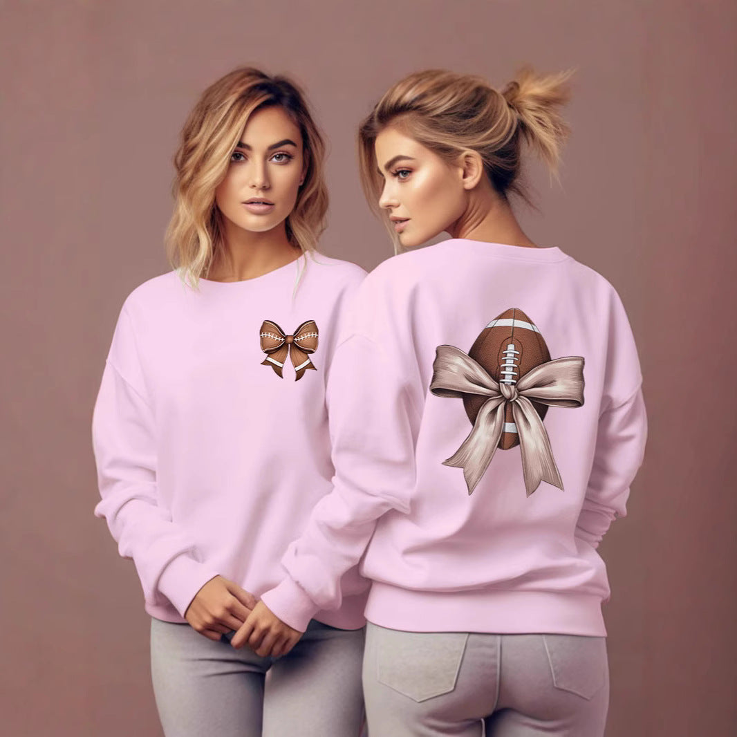 Dame sweatshirt med sødt fodboldmotiv og sløjfeaccent Stilla
